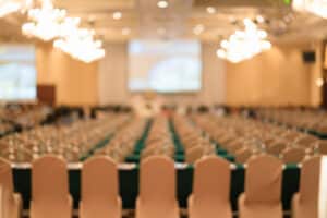abstract blurred people seminar event background
